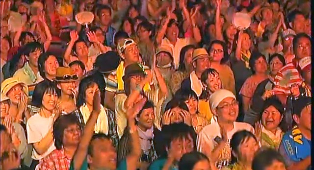 The afternoon sun was sizzling but the fans hung in there.