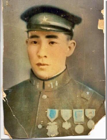 A photo of Uncle Hoso Inafuku with his medals.  My Dad said that uncle Hoso could not bend his knees... which I believe got broken during the war.  When he returned from the war, he was known as “stiff legs” in the village.