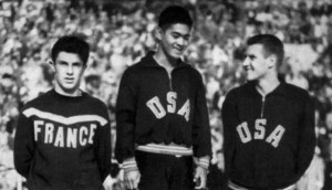 Standing on the podium at the Helinski Olympics in 1952.